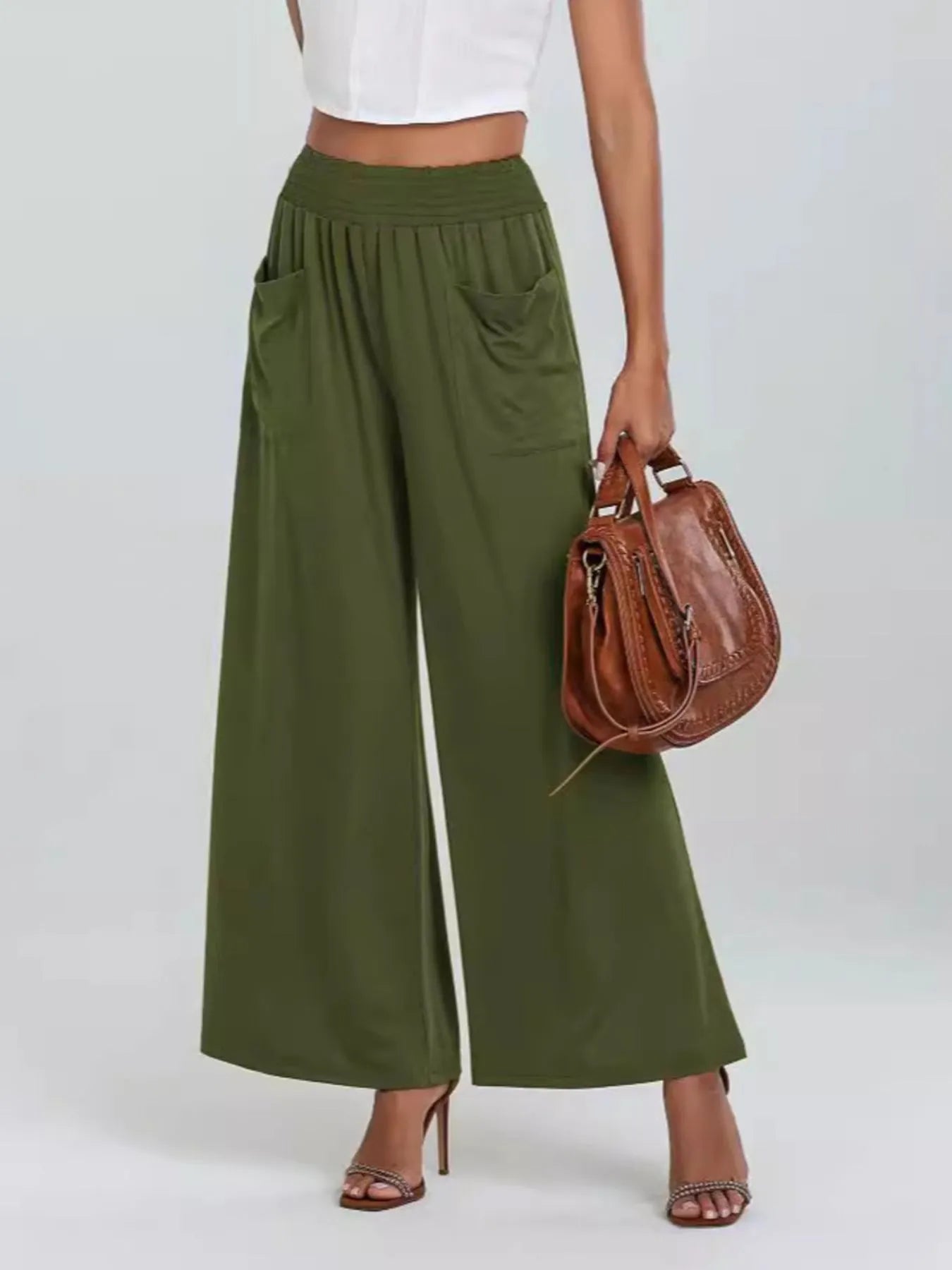 Green high-waisted wide-leg pants with elastic waist and side pockets