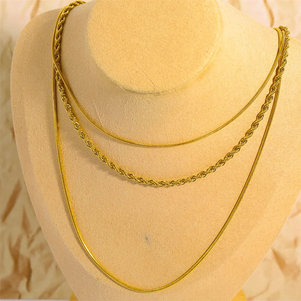 Gold-plated three-layer chain necklace with three curved drop lengths