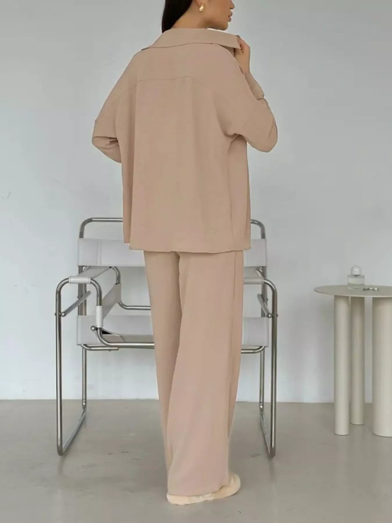 Tan relaxed-fit shirt and wide-leg pants set, back view with button front and collar