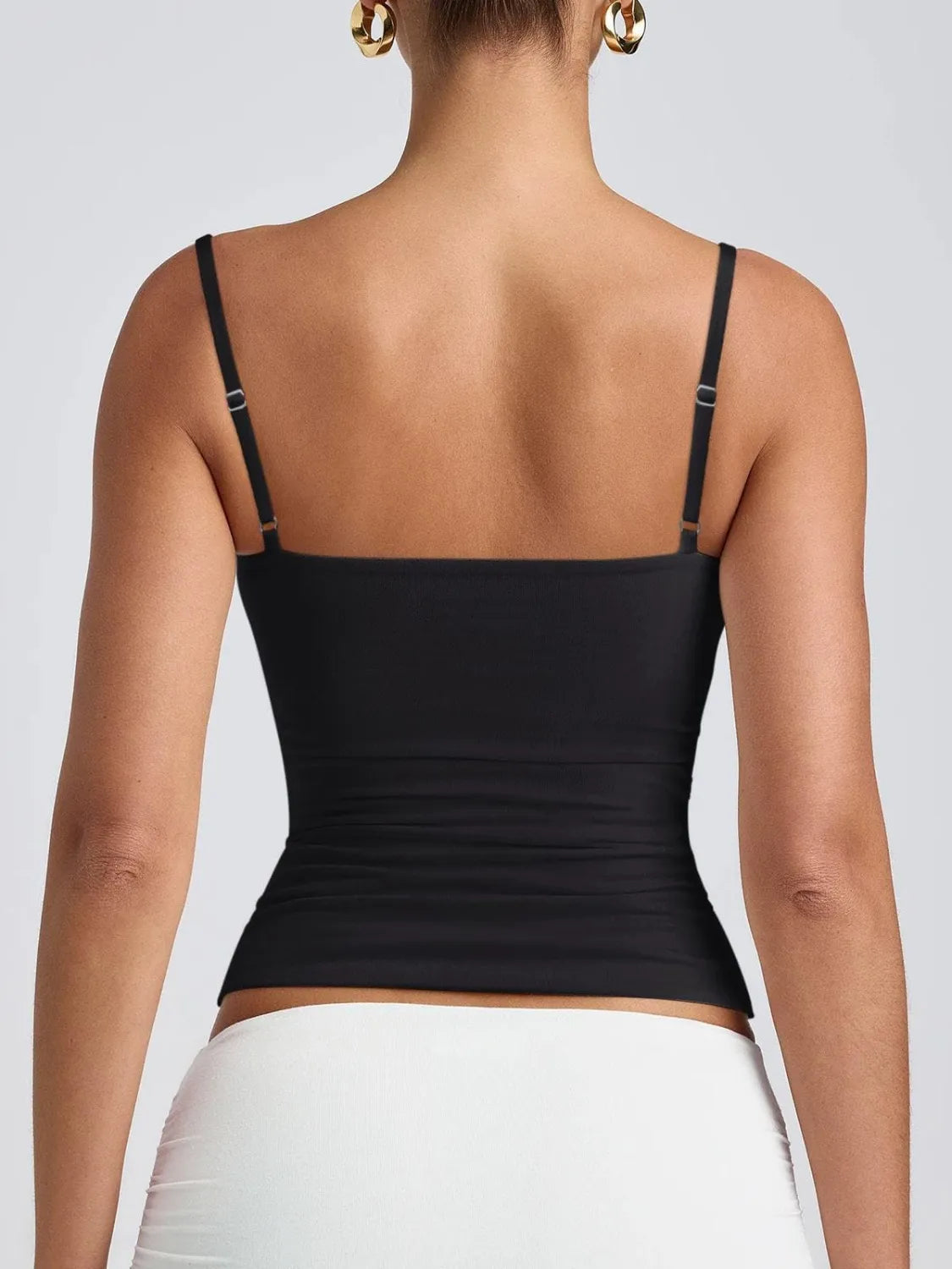 Black scoop neck cami with thin spaghetti straps, ruched stretch fit