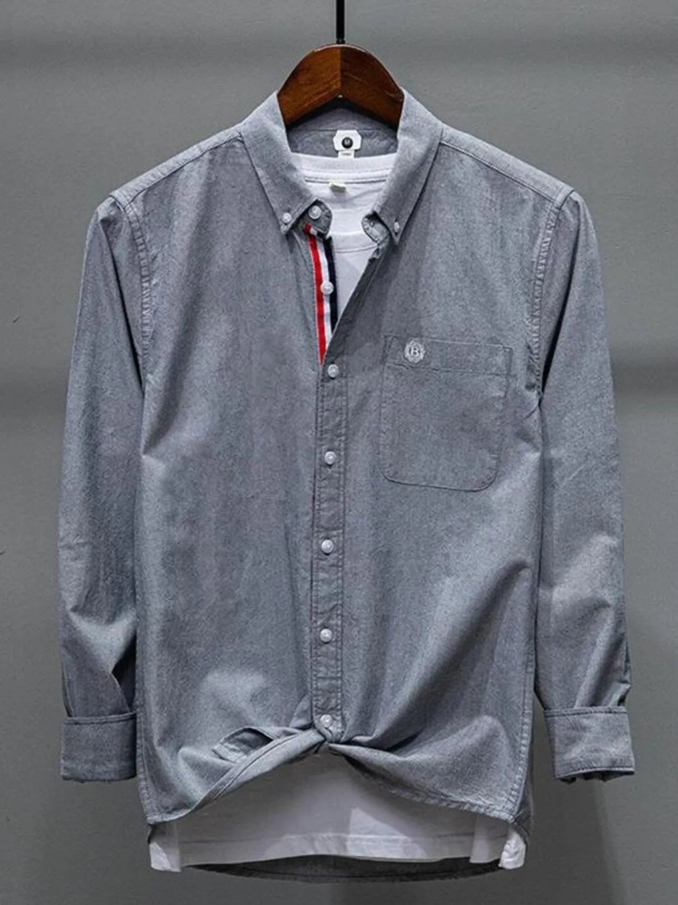 Grey button-up long-sleeve shirt with chest pocket and collar