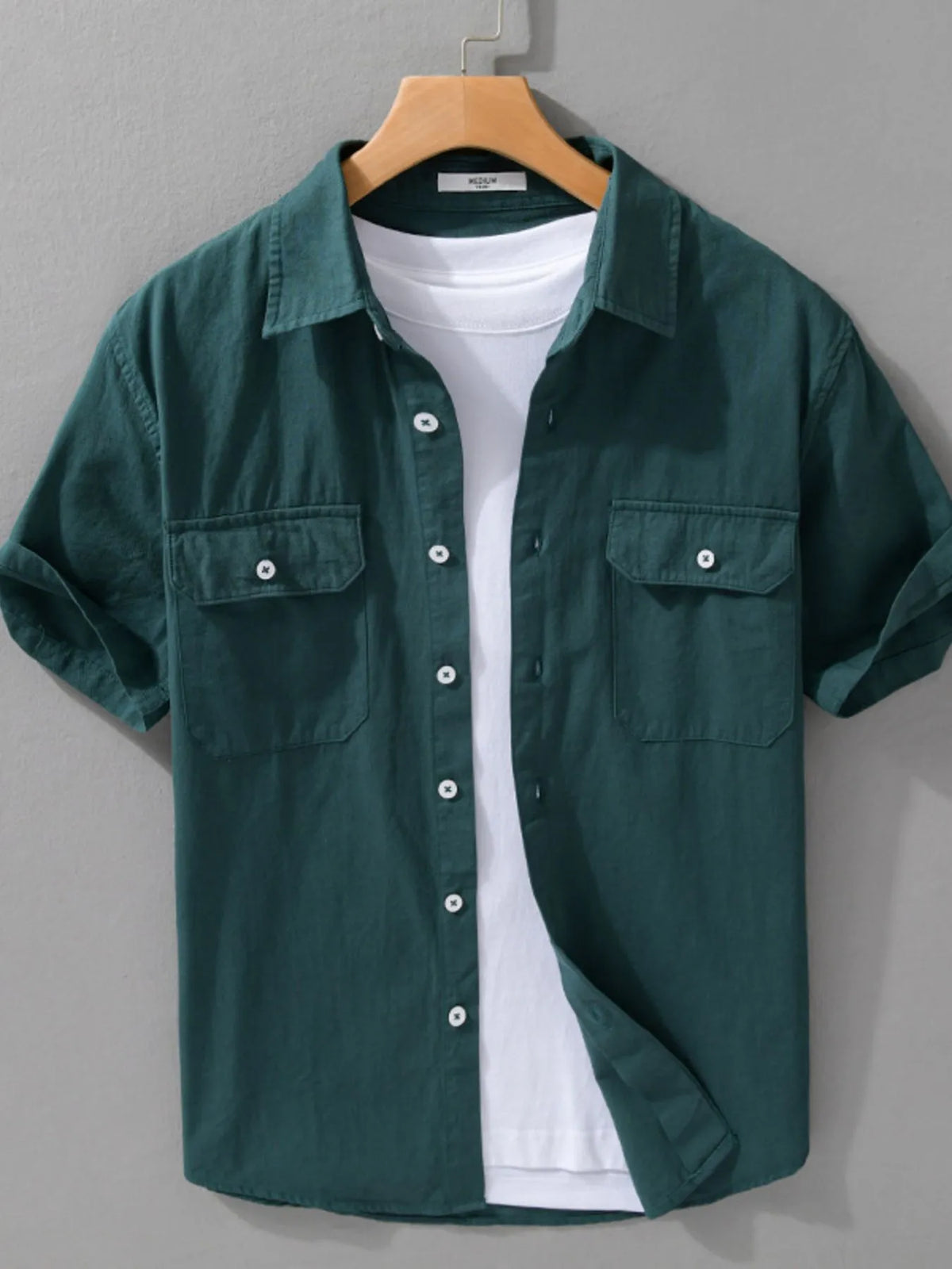 Men's short-sleeve cotton button-up shirt, dark green, chest pockets and button front