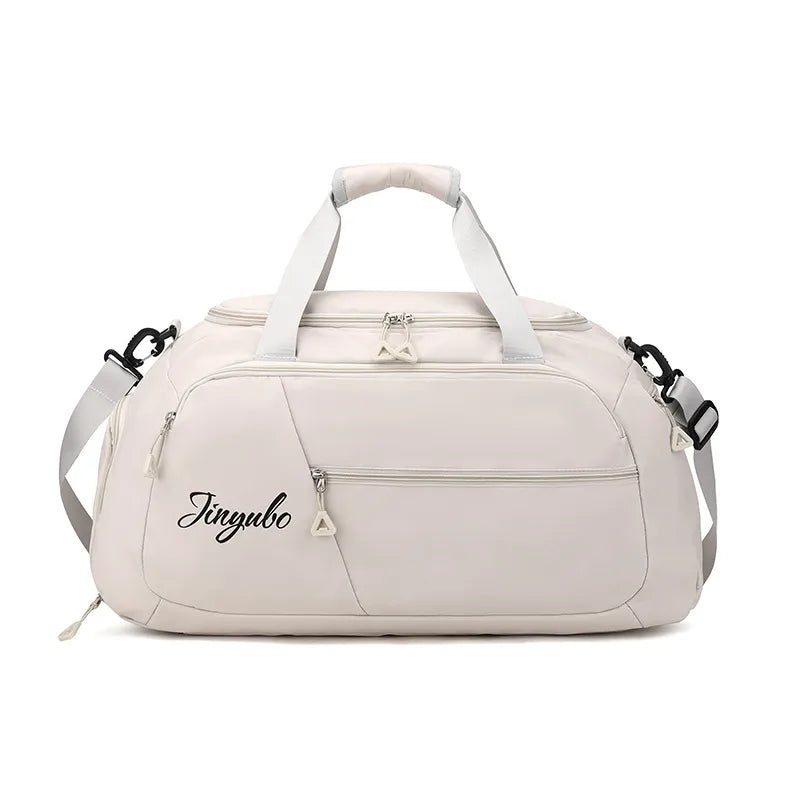 Large nylon travel duffel bag in beige with contrast off-white front panel and zip compartments