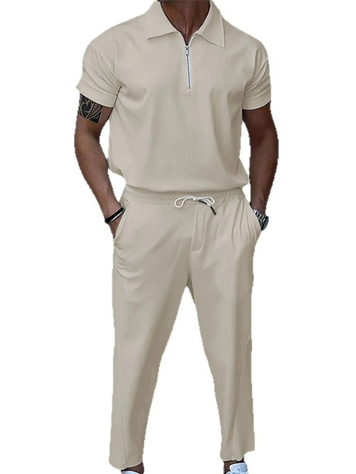 Light beige quarter-zip polo and matching drawstring pants set on model