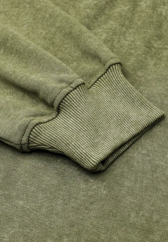 Moss green sweatshirt cuff detail with ribbed knit trim