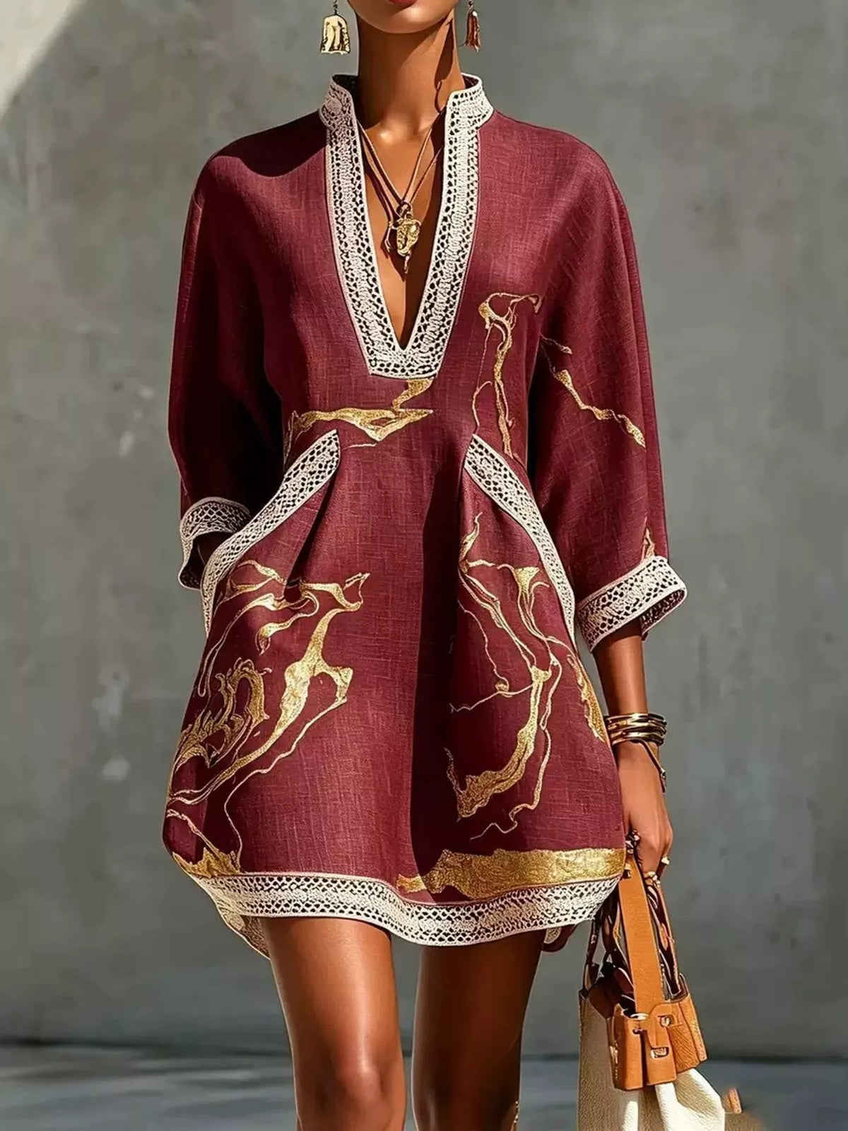 Burgundy mini dress with gold motif print, V-neck lace trim, relaxed loose fit