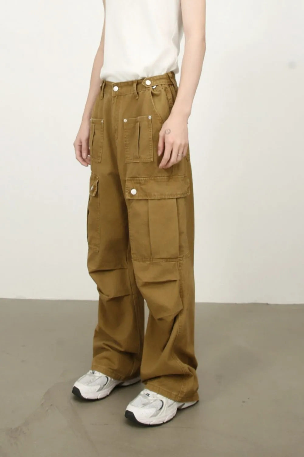 Khaki cargo jeans with drawstring waist and side flap pockets