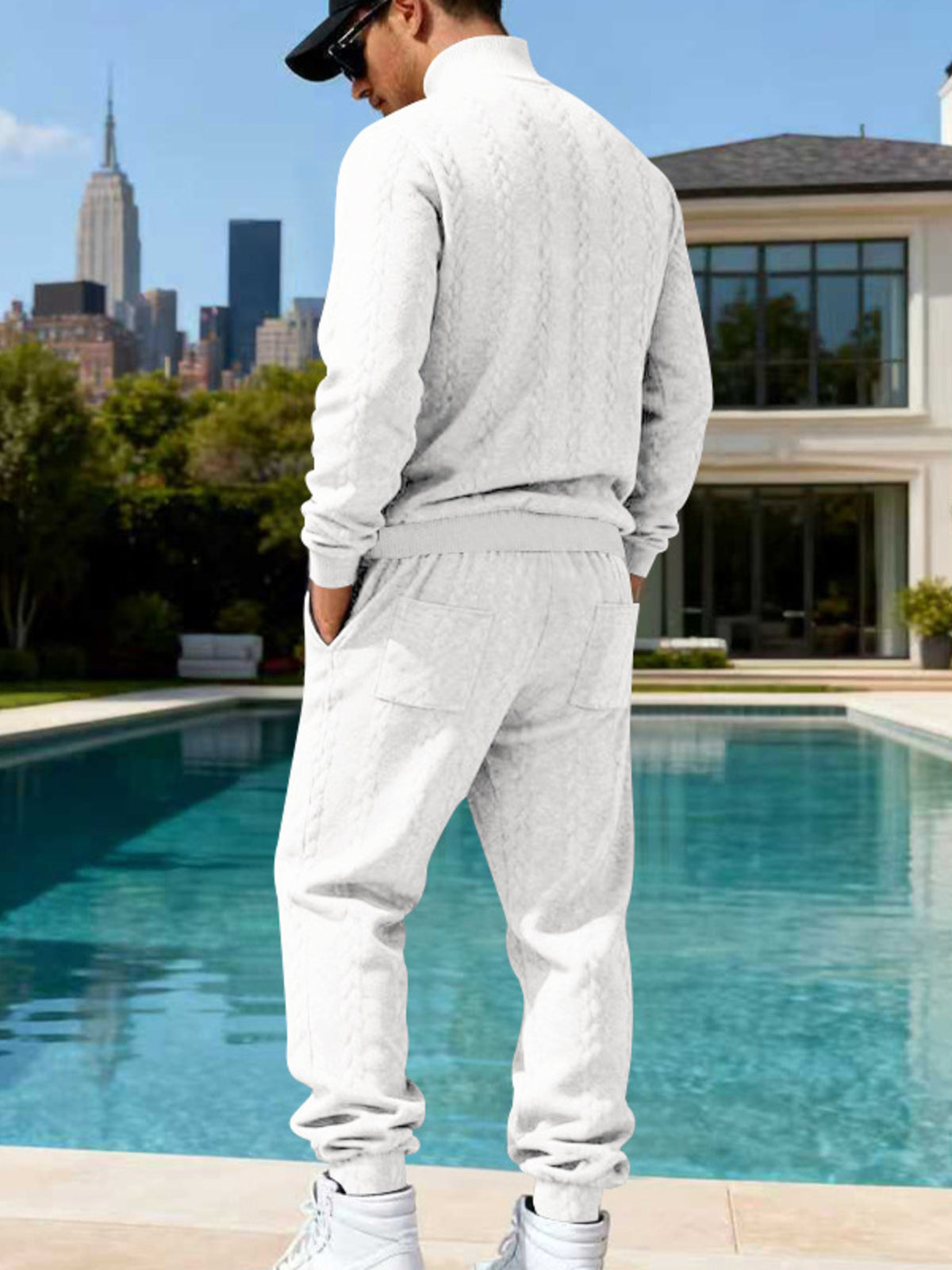 Men's white cable knit mock neck sweater and jogger pants set, back view