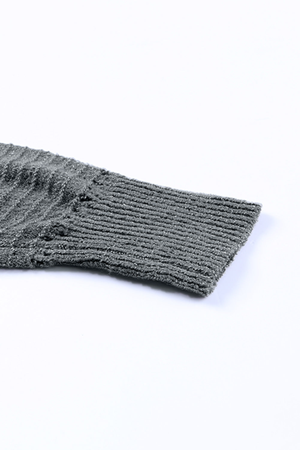 Gray knit cardigan cuff and hem with textured ribbed trim
