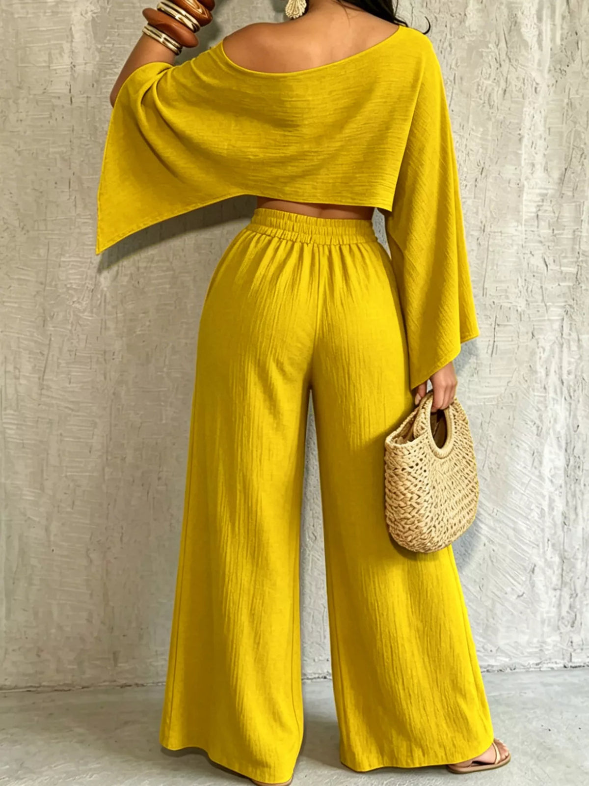 Yellow boat-neck crop top and wide-leg pants set with loose flowy sleeves
