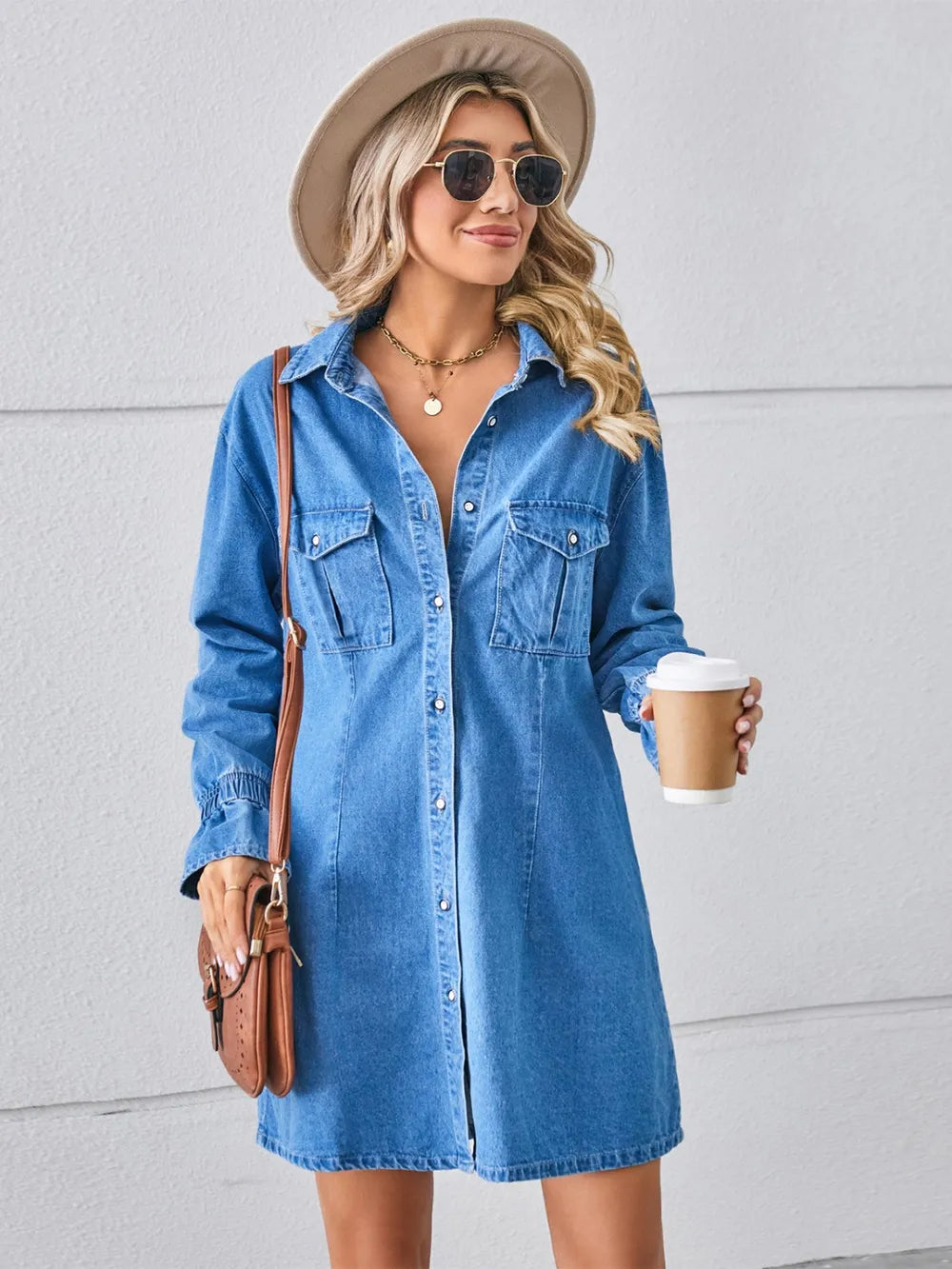 Dusty blue denim mini dress, dropped shoulders, button front, chest pockets, long sleeves