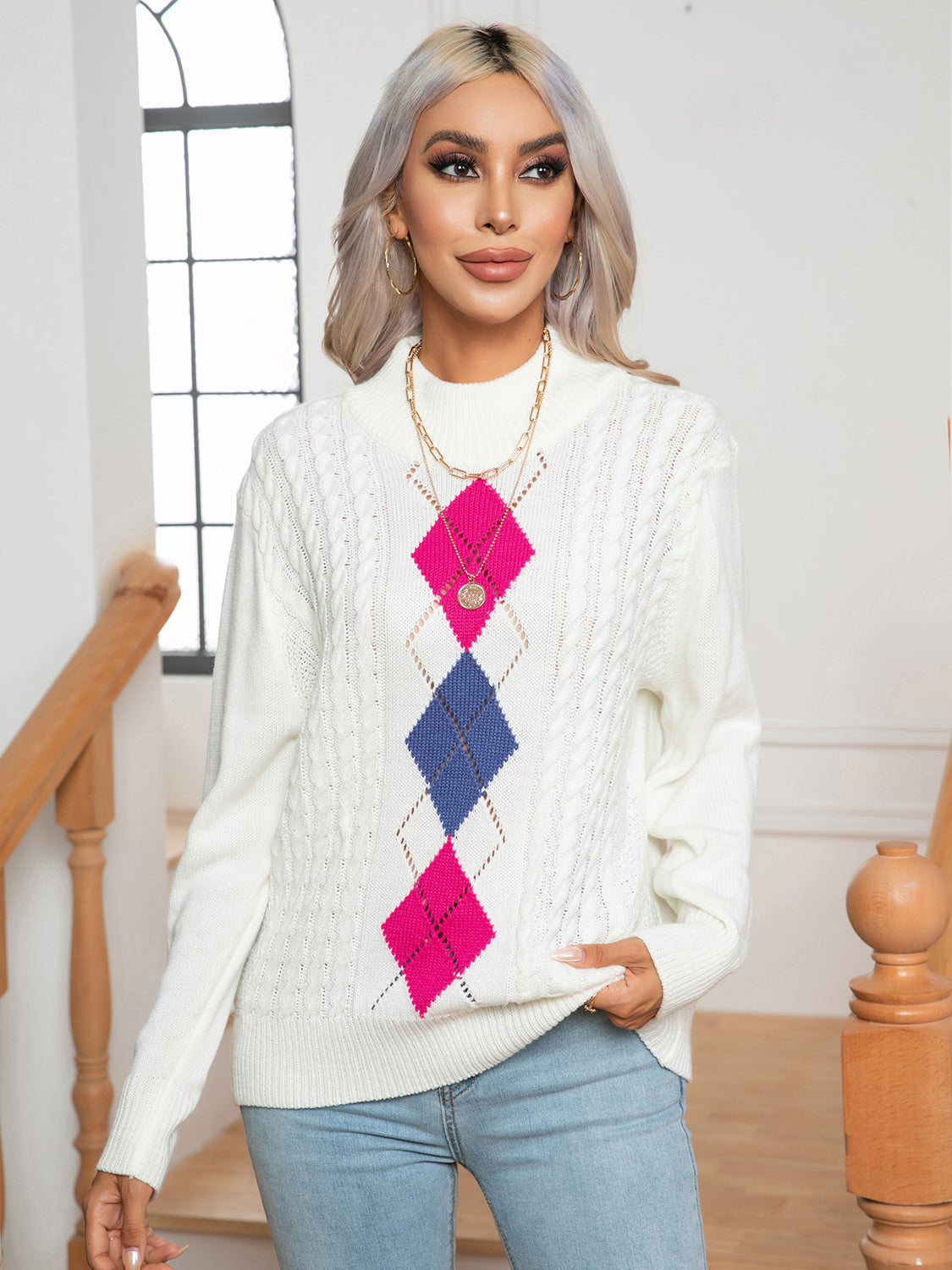 White openwork geometric mock neck sweater with diamond pattern and long sleeves
