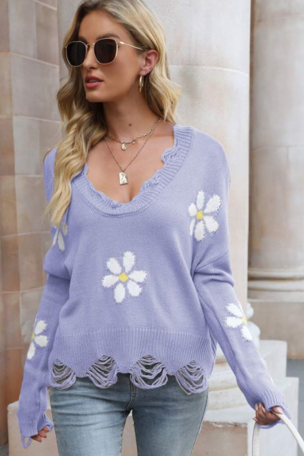 Lilac knit sweater with daisy appliques and ribbed distressed hem