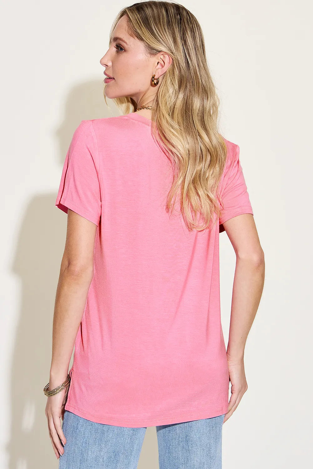 Cedar & Moore Basic Bae Full Size V-Neck High-Low T-Shirt in pink; short sleeves, back view.