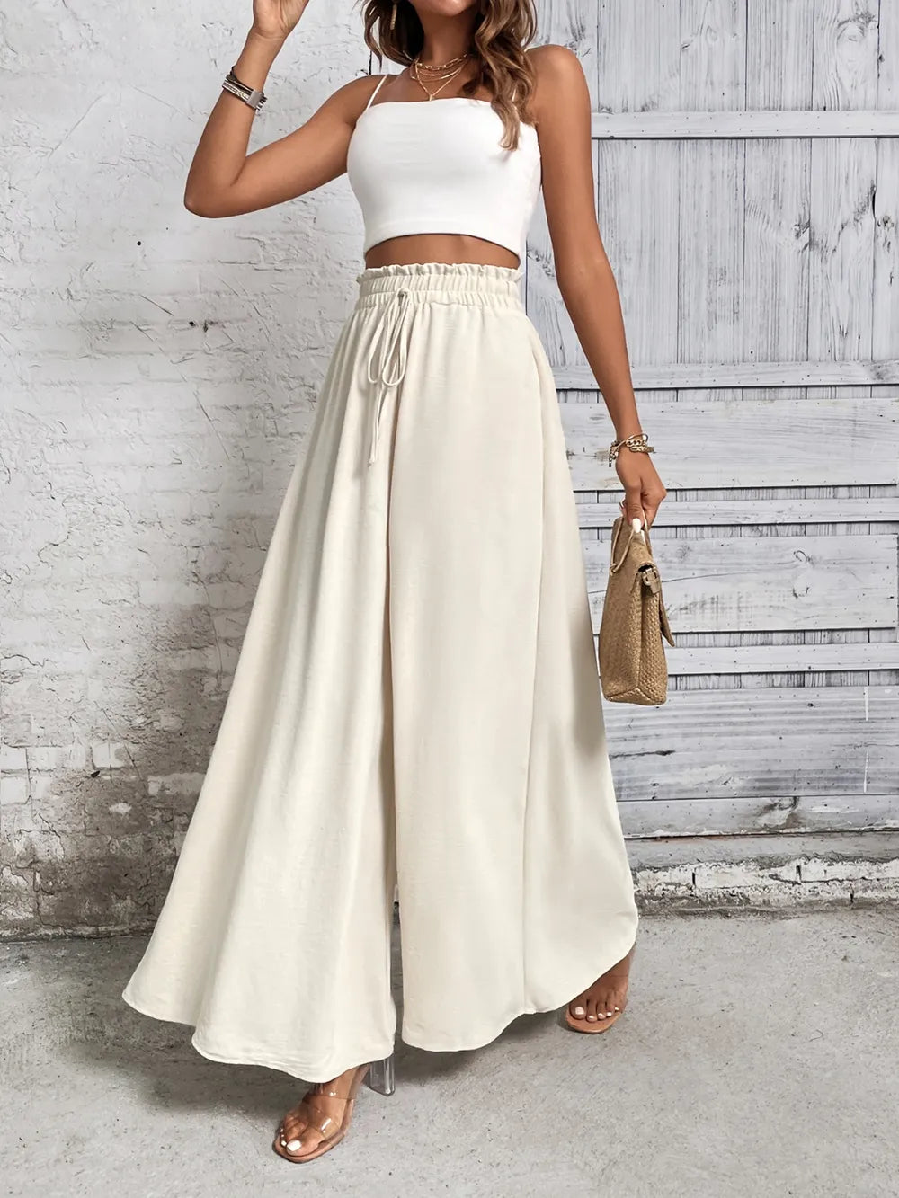 Cream high waist wide-leg pants with elastic waistband and drawstring ties