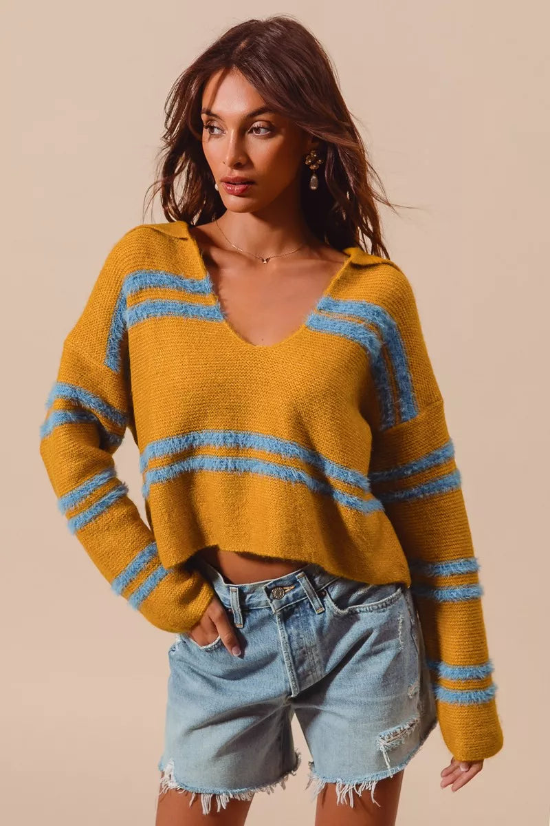 Mustard fuzzy striped sweater with deep U neck and light blue horizontal stripes