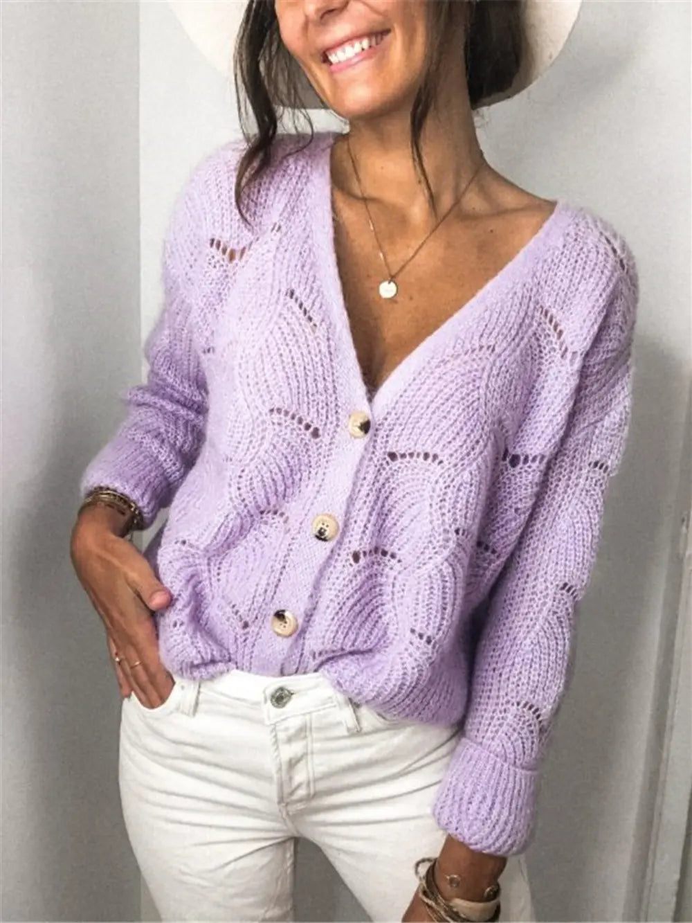 Lavender openwork button-up cardigan with V-neck and long sleeves, button front placket.