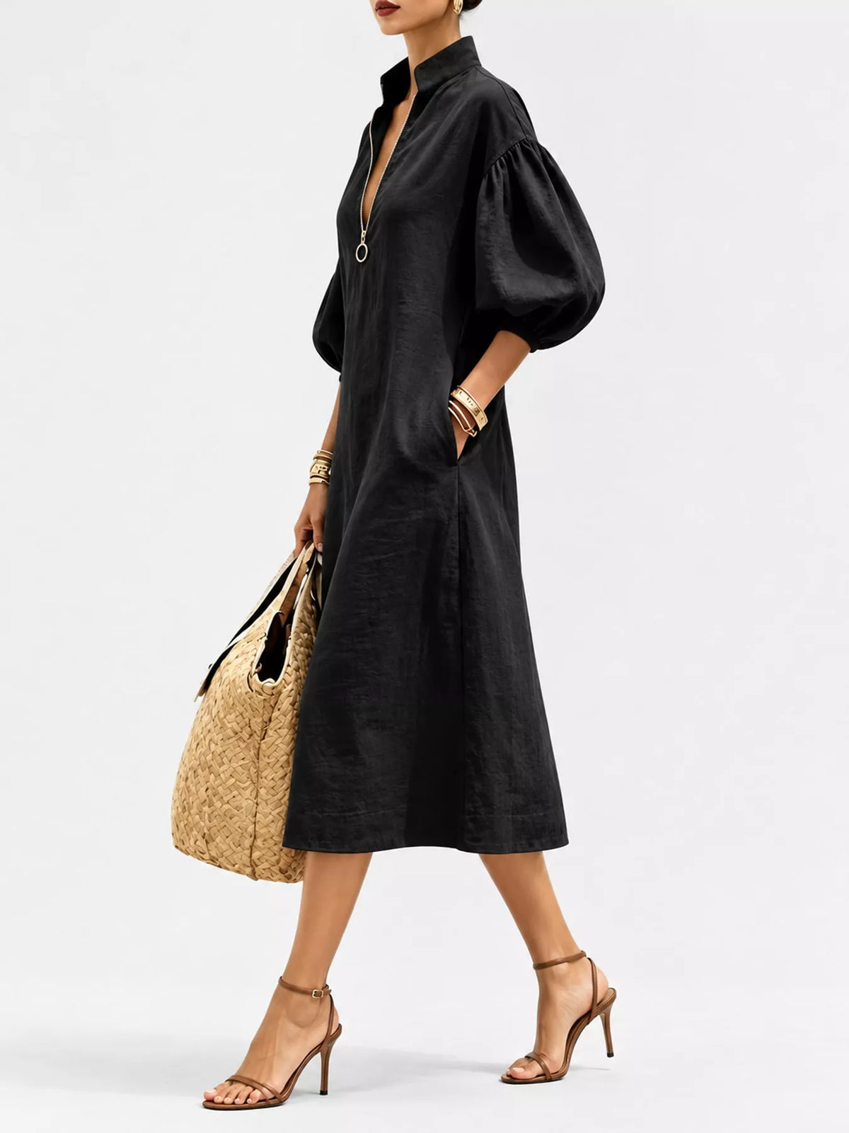 Black midi dress with half-zip and puff sleeves, side three-quarter view