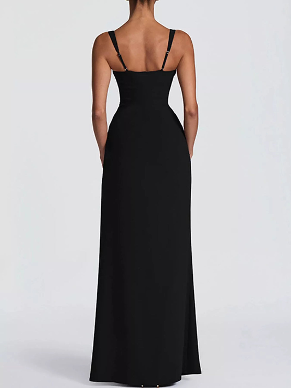Black backless maxi dress with spaghetti straps and ruched bodice
