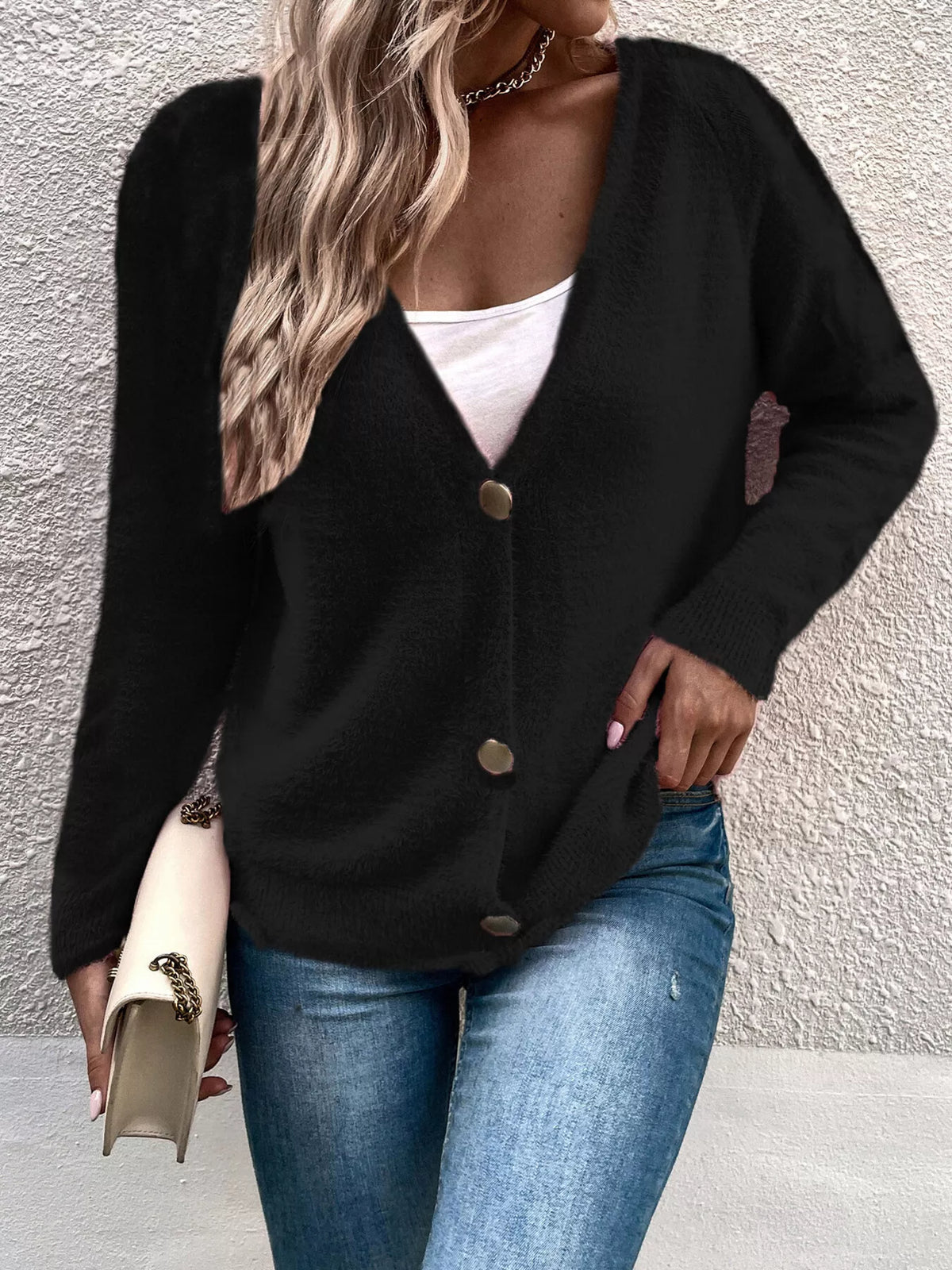 Black fuzzy v-neck cardigan with button front and long sleeves
