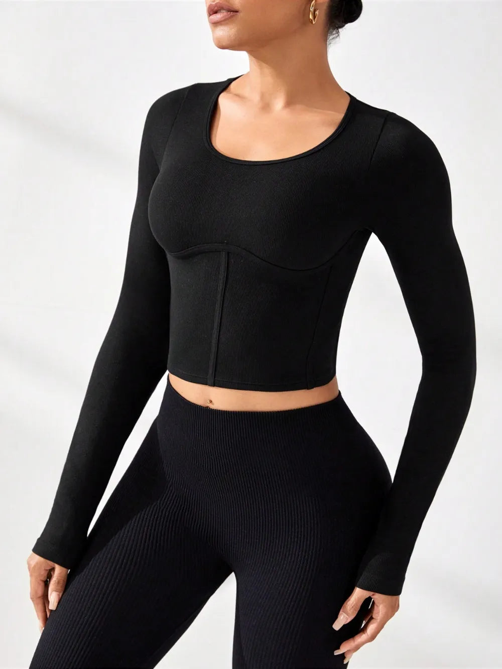 Black round-neck long-sleeve active t-shirt, cropped