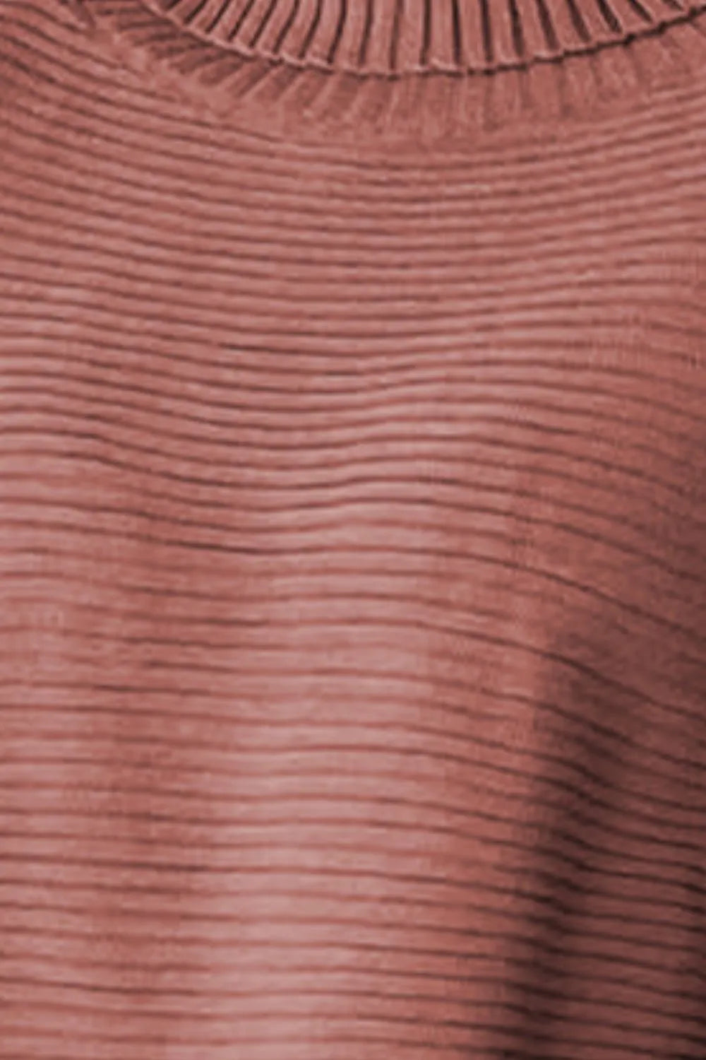 Brick red ribbed knit fabric close-up with fine horizontal texture lines