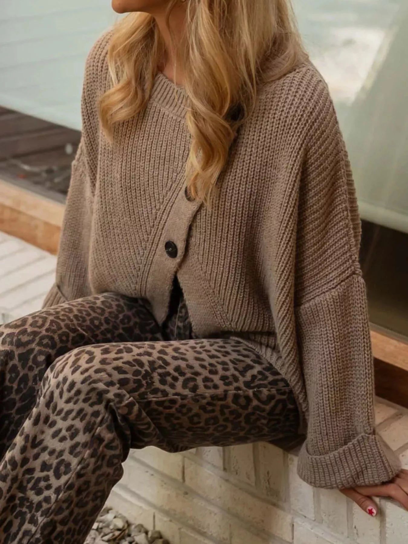 Asymmetrical button-detail knit sweater in khaki, side opening with buttons