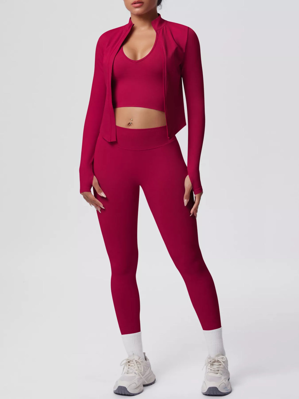 Cerise three-piece workout set with zip jacket, sports bra and leggings