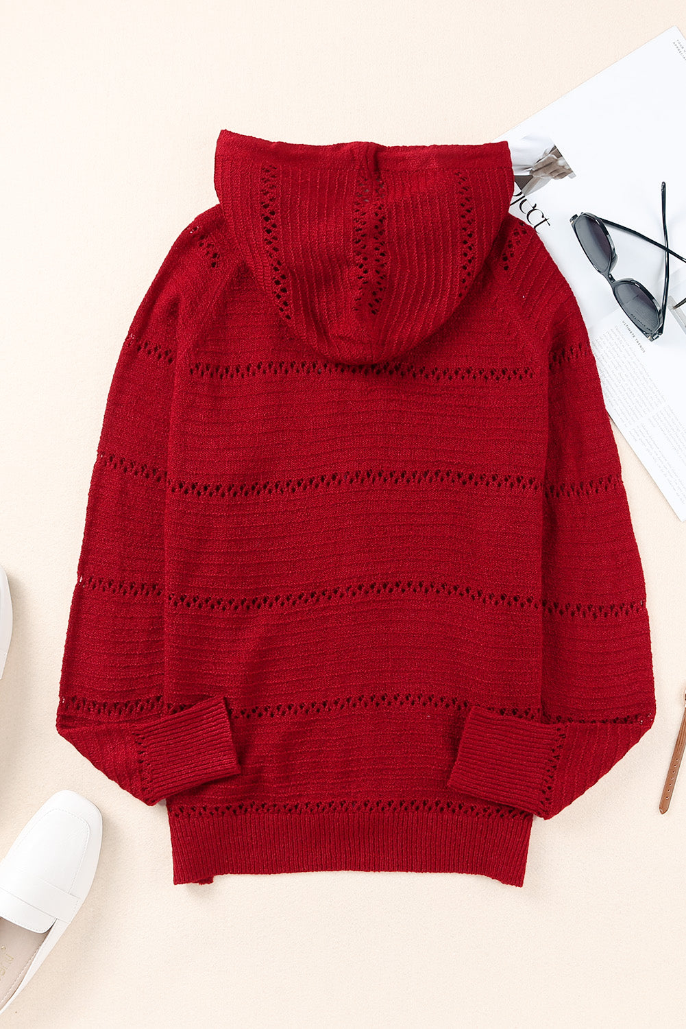 Red openwork knit zip-up hooded cardigan with ribbed cuffs and hem