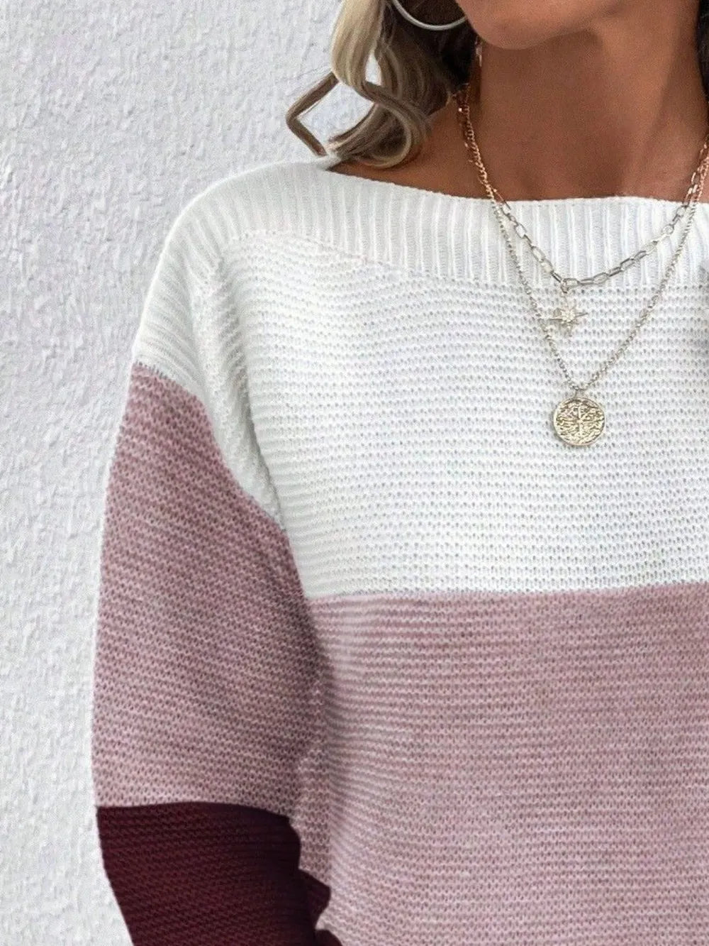 Color-block boat neck sweater in white with dusty pink and burgundy accents.