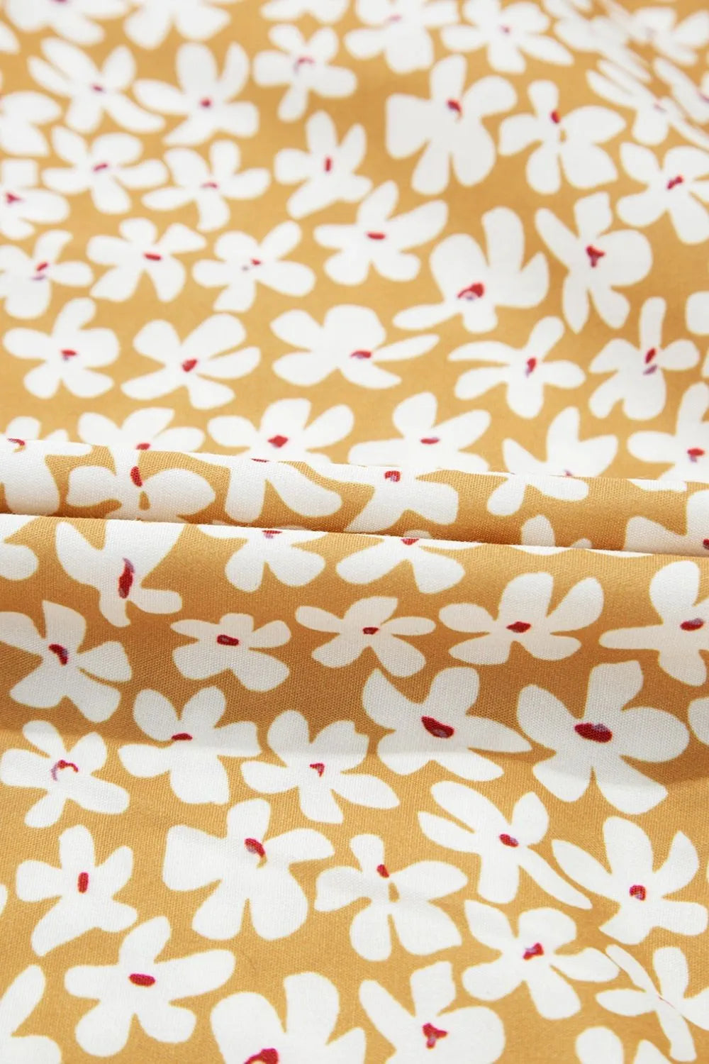 Floral short sleeve surplice frilly tiered mini dress; mustard-yellow fabric with white flowers, Trendsi