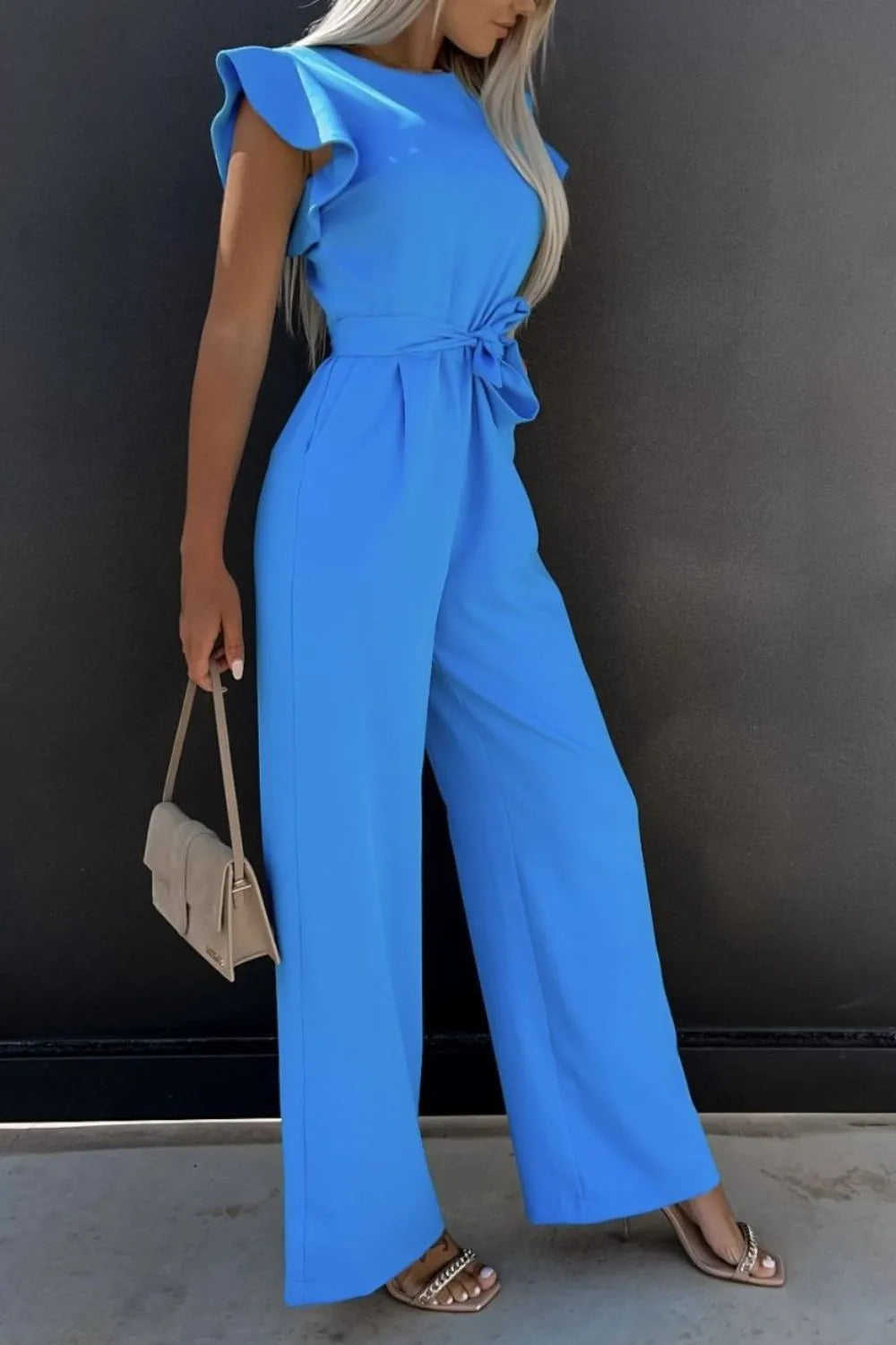 Blue round-neck cap-sleeve jumpsuit with waist tie and wide-leg pants