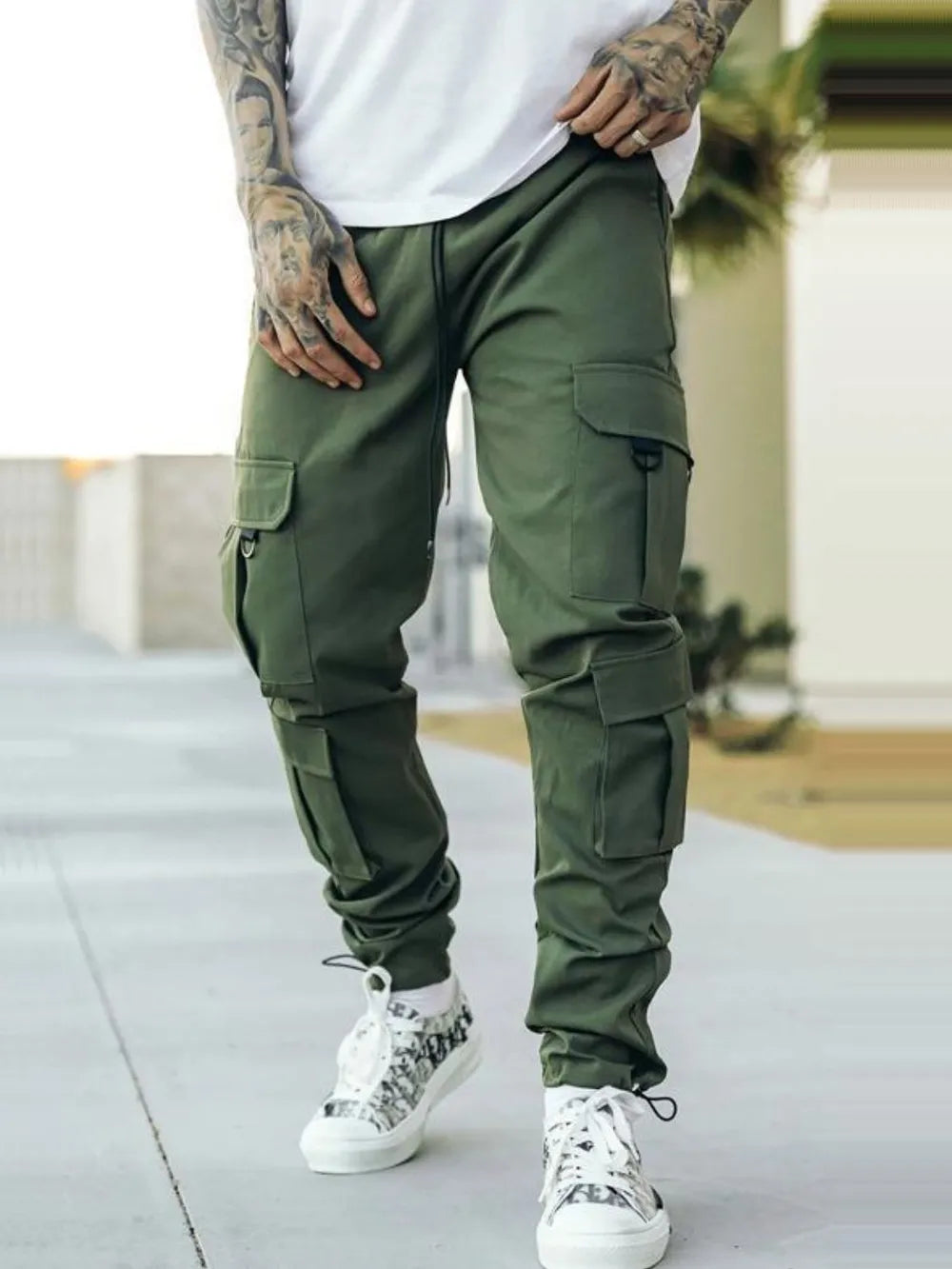 Men's army green cargo pants with drawstring waist and side flap cargo pockets