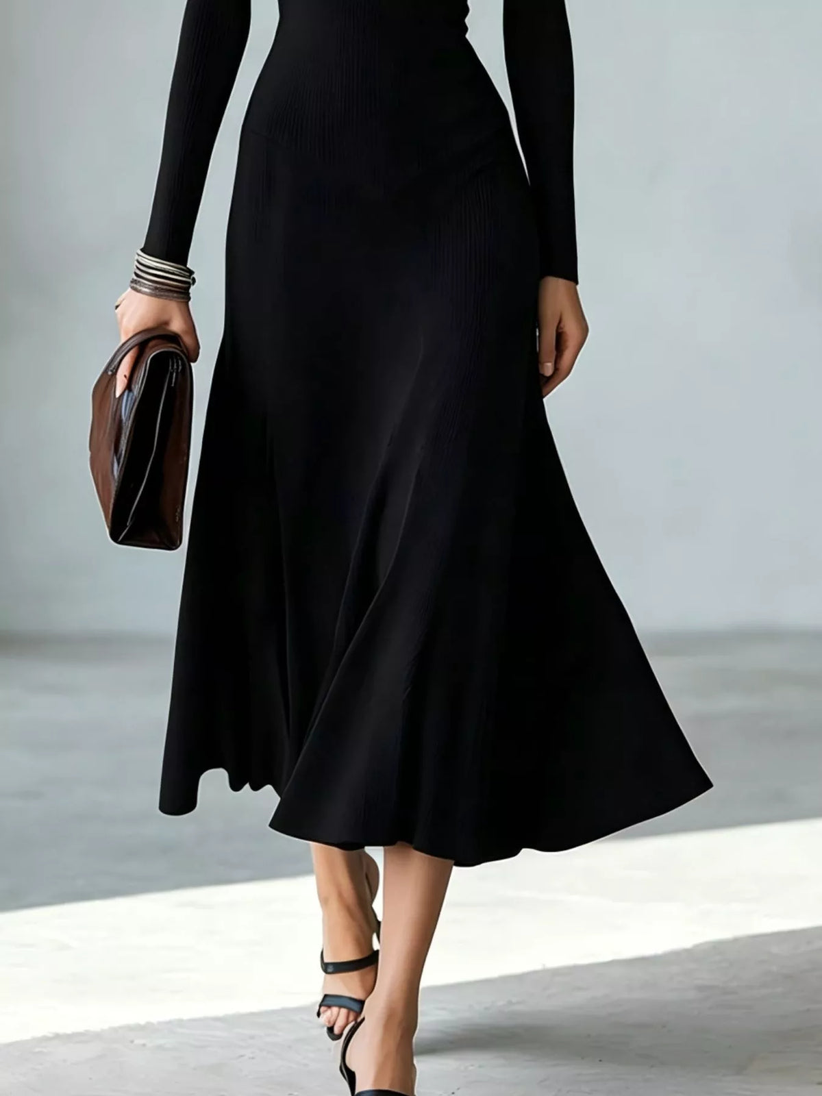 Black mock neck cutout long-sleeve midi dress with draped fabric and flared hem