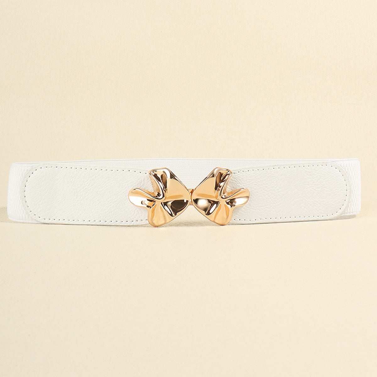 White alloy buckle elastic belt with gold bow centerpiece