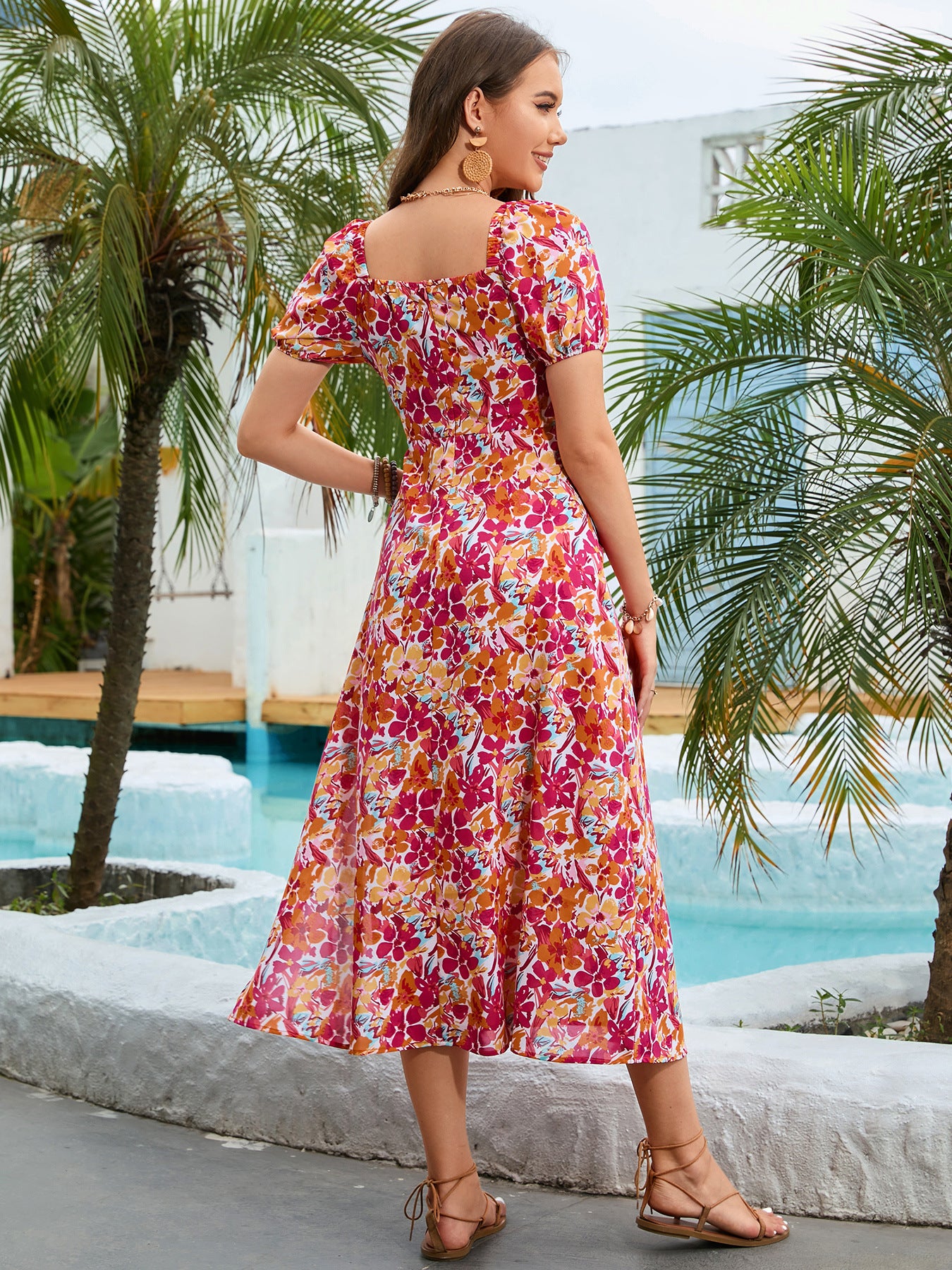 Floral square-neck midi dress, short sleeves, multicolor print; side view on model