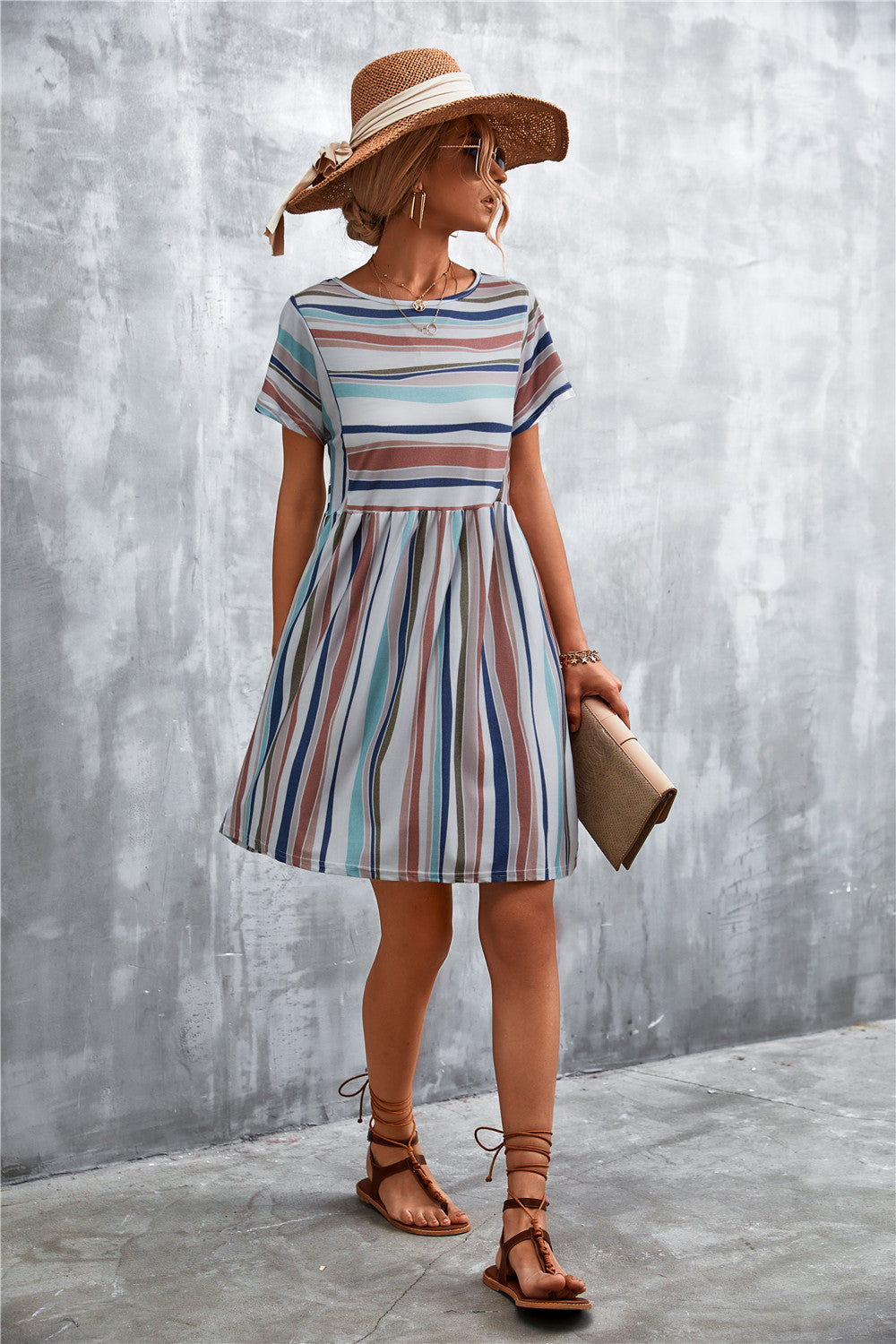 Striped round-neck dress, back view, short sleeves, blue and coral vertical stripes, waist