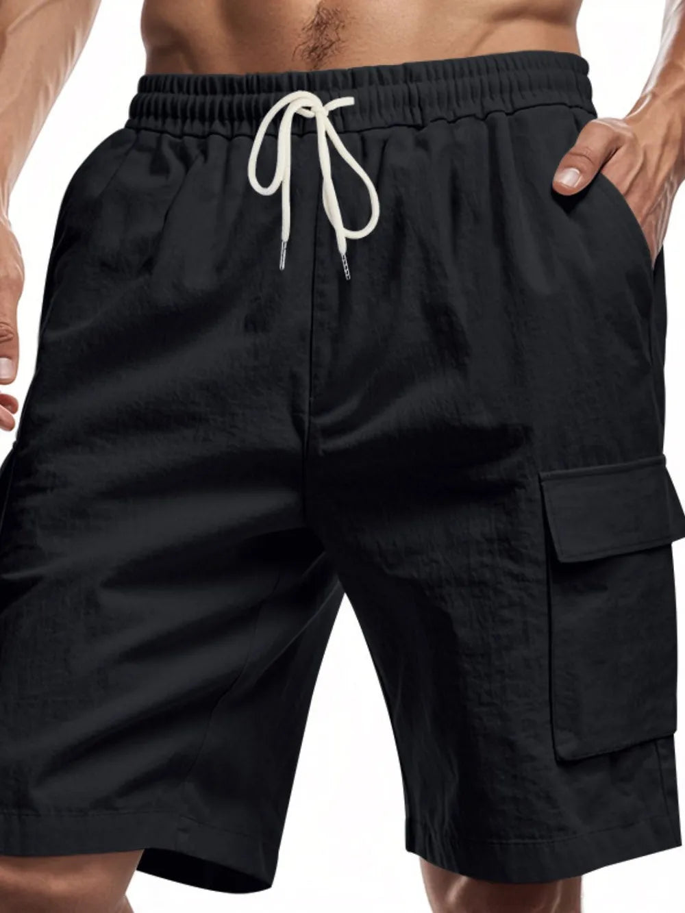 Men's black drawstring cargo shorts with elastic waistband and side flap cargo pocket
