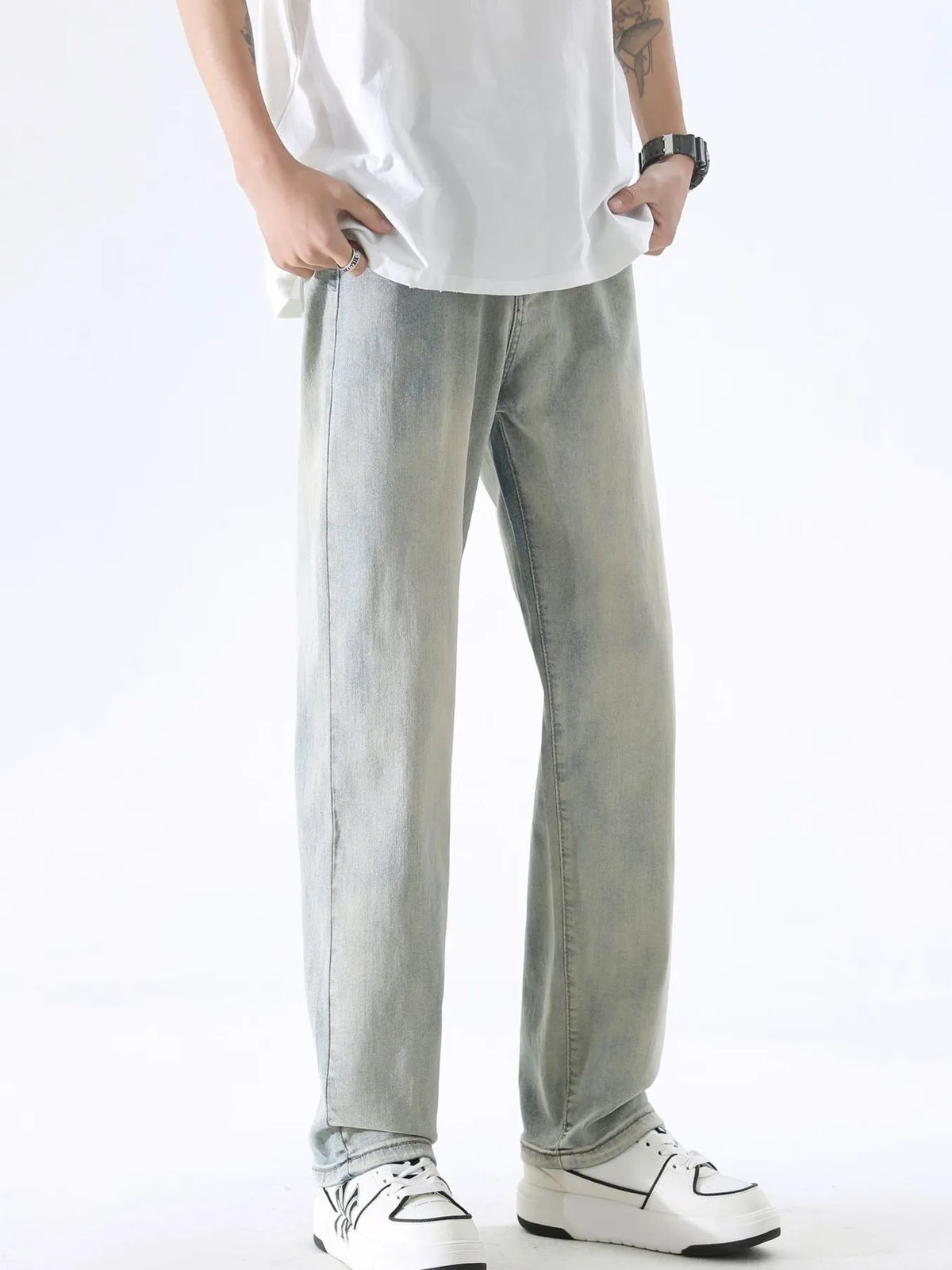 Washed light gray wide-leg jeans with straight leg cut and five-pocket styling.