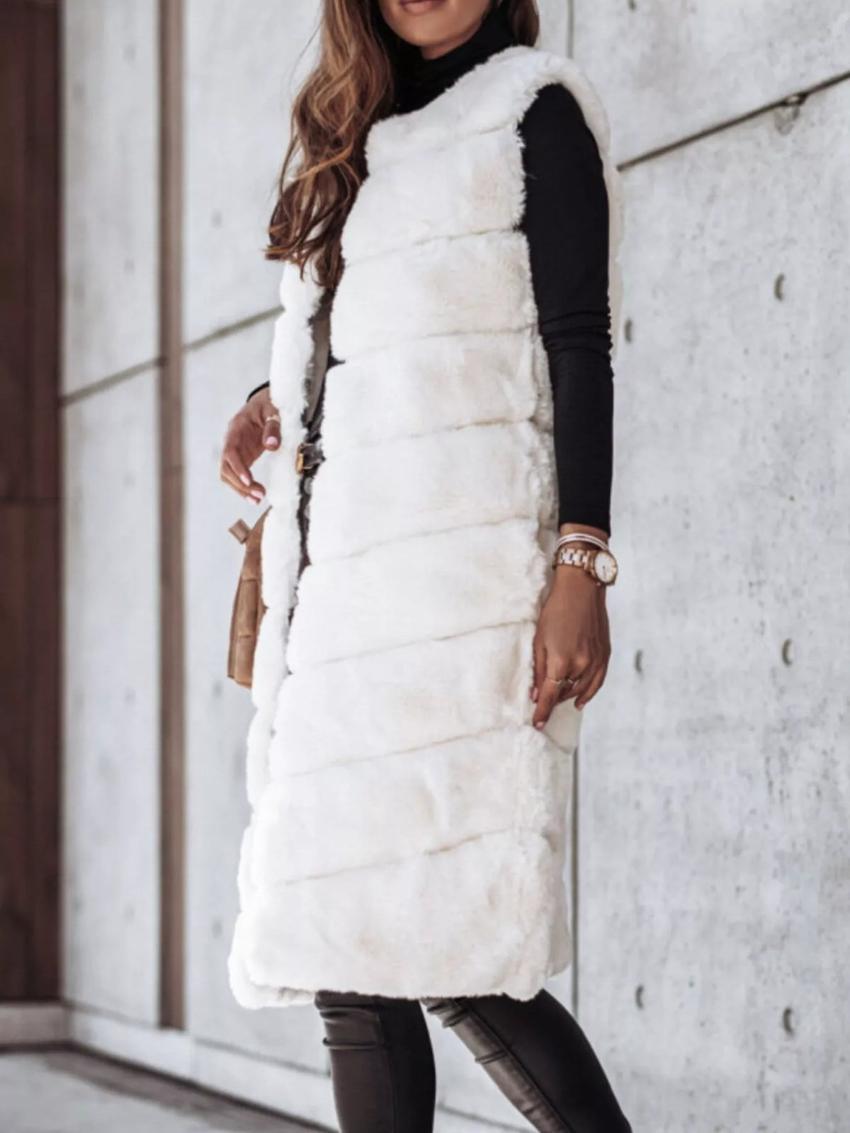 Women’s white faux fur longline vest coat, sleeveless with thick fur trim at edges