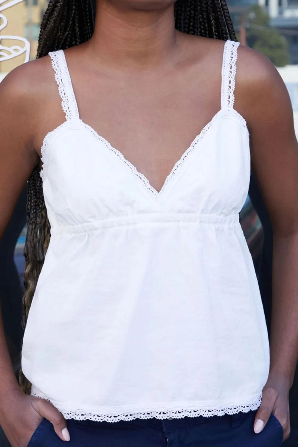 White lace-trim V-neck cami with thin straps and scalloped hem