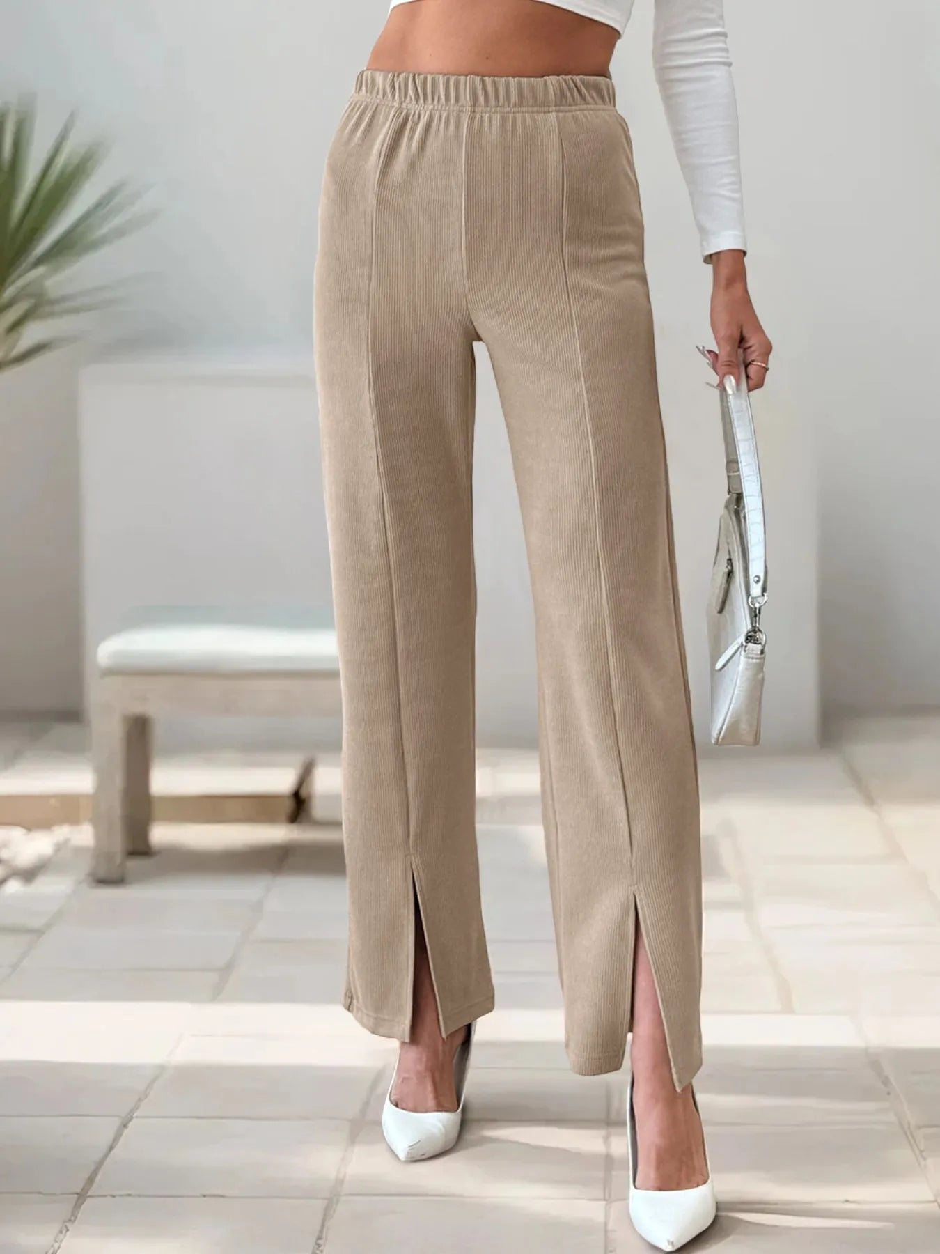 Khaki high-waisted wide-leg pants with elastic waistband and front slit