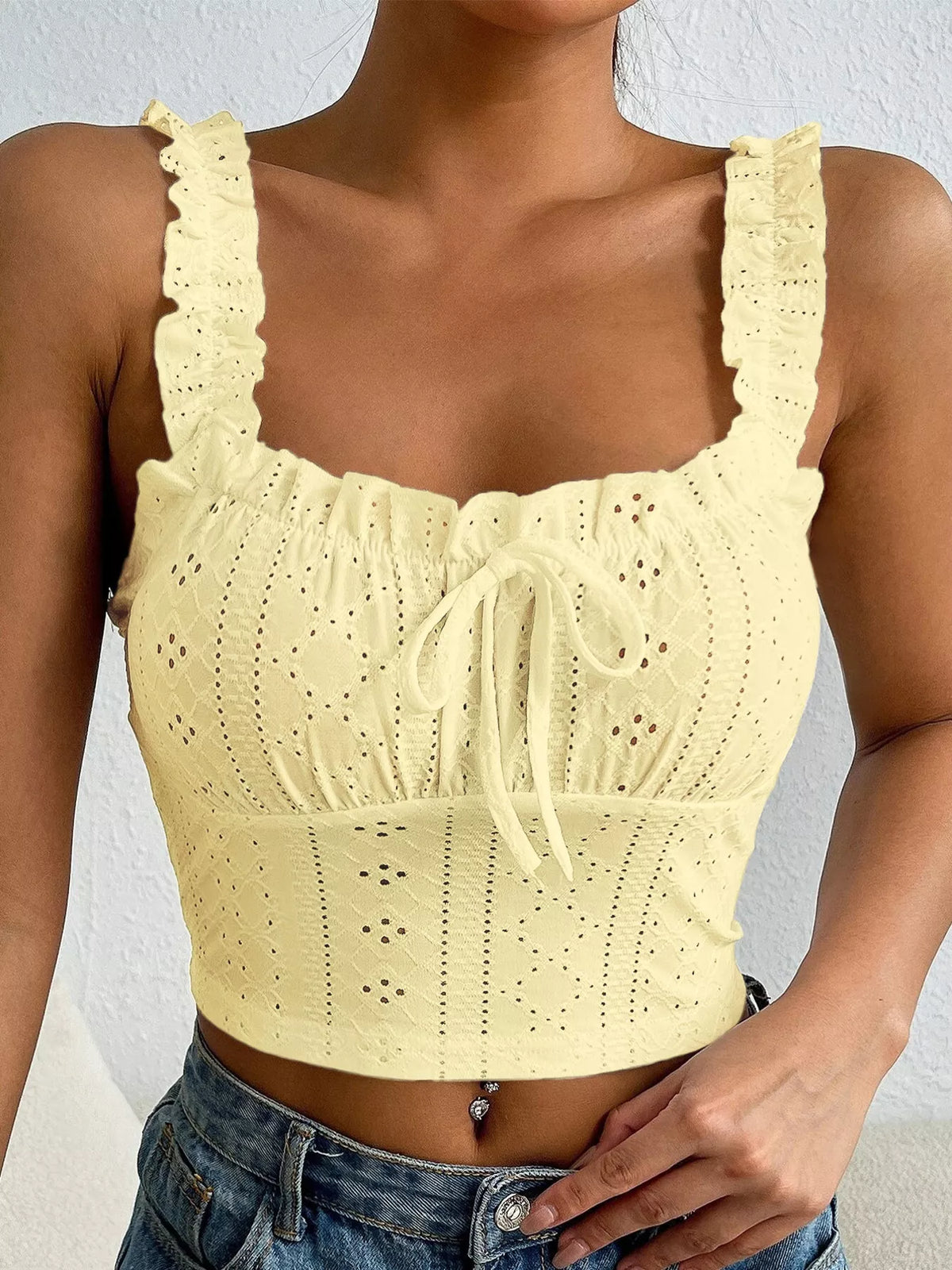 Yellow eyelet ruffle strap tie-front tank top with bow-tie front and gathered bust