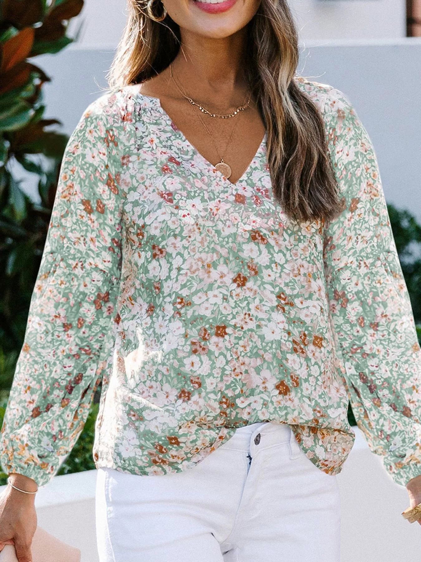 Cedar & Moore Full Size floral print V-neck long sleeve blouse plus size in mint green with white and orange flowers.