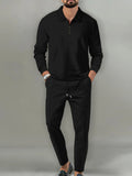 Black long-sleeve quarter-zip top and jogger pants set for men