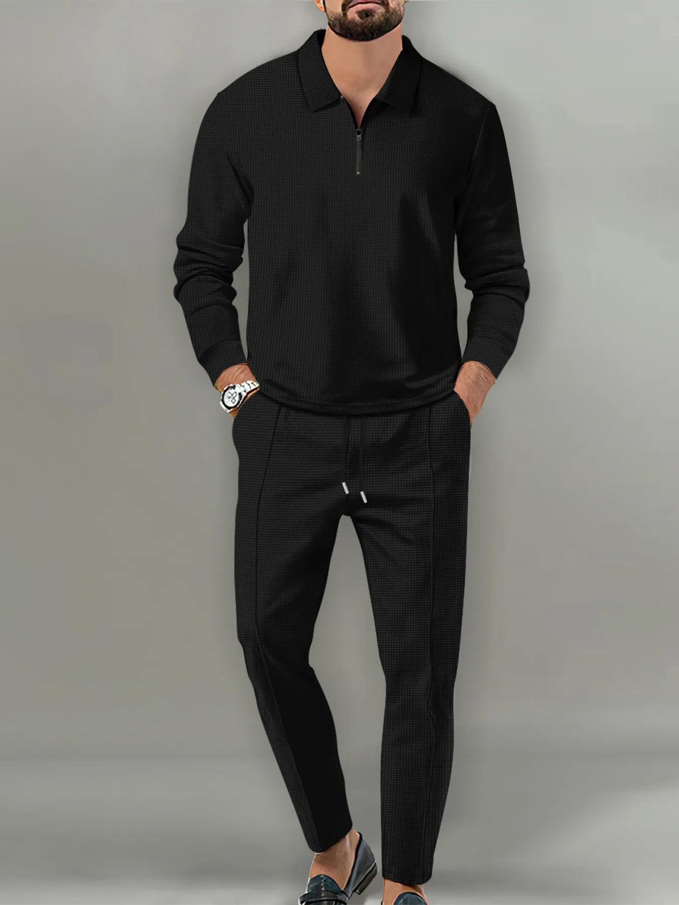 Black long-sleeve quarter-zip top and jogger pants set for men