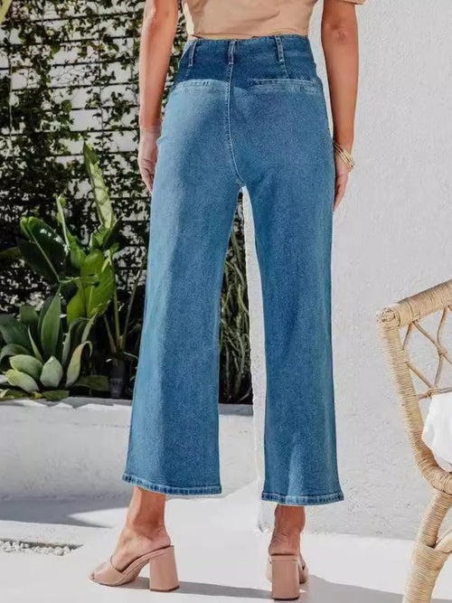 Light blue button-fly cropped jeans with front pockets, wide leg and five-button waistband