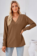 Brown V-neck long-sleeve blouse with diamond texture and buttoned cuffs