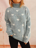 Heart-patterned heathered blue turtleneck drop-shoulder sweater, front view