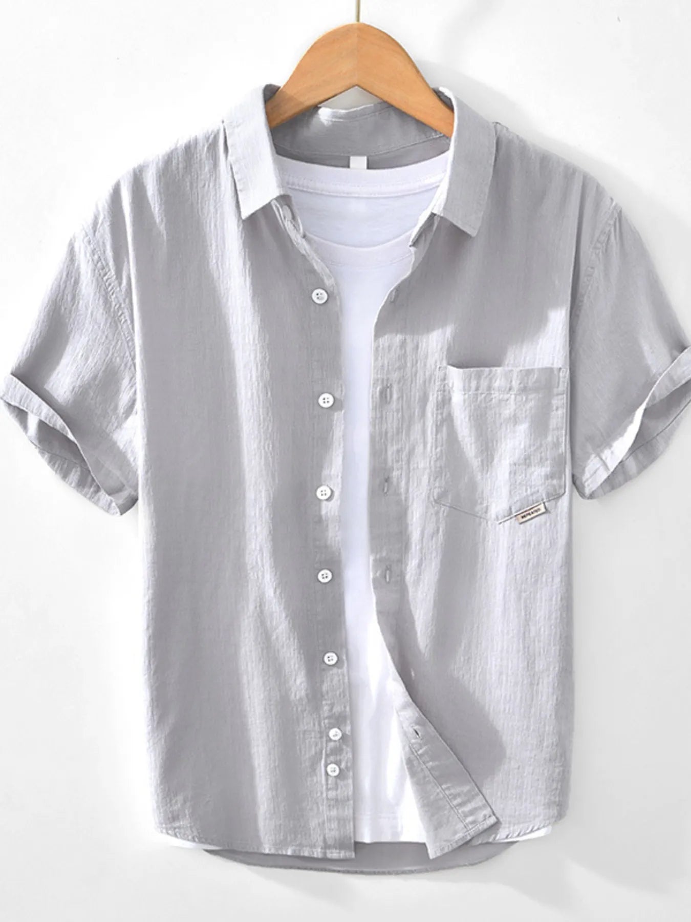 Men's short sleeve button-up shirt, light gray, with chest pocket and button front